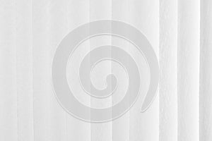 White curtain background abstract. Vertical pattern texture and sofe focus. Christmas, winter, new year concept for backdrop desig