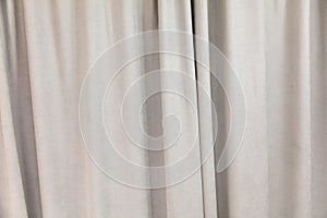A white curtain with a pattern of zigzags