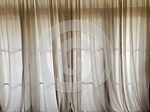 White curtain to block the sunlight at the door in living room h
