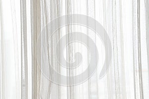 White curtain wavy with a pattern background. transparent curtain on window