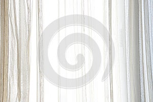 White curtain wavy with a pattern background. transparent curtain on window