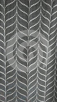 A white curtain in the window