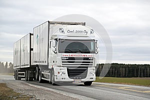 White DAF XF 105 Full Trailer Truck on the Road