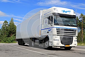 White DAF XF 105 Semi Truck Parked in Summer