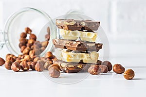 White and dark nut chocolate with hazelnuts