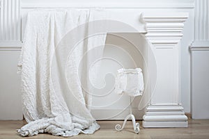 White decoration for a studio with a cloth and a