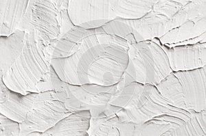 White decorative abstract plaster texture with textured smears.