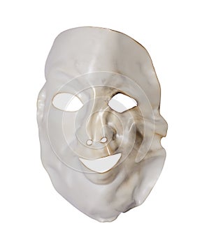White deformed mask isolated on white photo