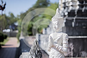 White Deity or Seraph Buddha Statue photo