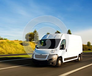 White delivery van on highway