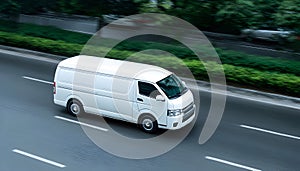 White delivery van on highway road.