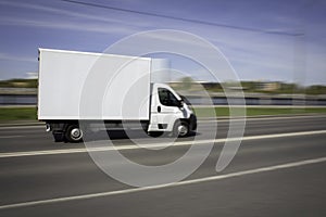 White Delivery Van Speeding on street