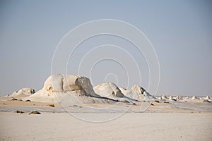White desert, lime stone rock formations and desert landscape. Morning light, scenic nature. Nobody, alone in the wilderness. photo