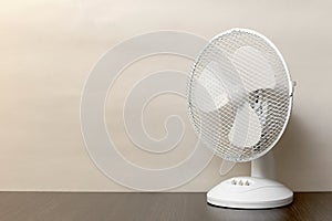 White desk oscillating fan