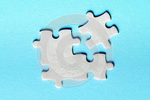 White details of puzzle on a blue background