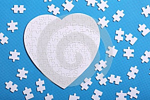 White details of a puzzle on a blue background. A puzzle is a pu