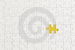 White details of puzzle on yellow background. Business strategy, teamwork