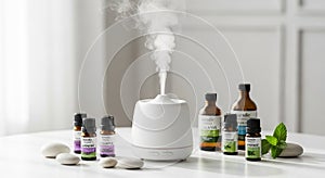 A white diffuser emits steam on a white table, surrounded by essential oil bottle