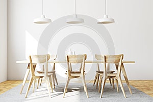White dining room interior, wooden chairs