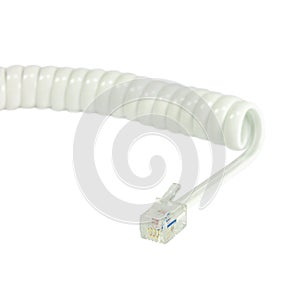 White disconnected telephone handset extension cord, curly coil line spiral wire cable, isolated 4P4C RJ22 connector jack landline