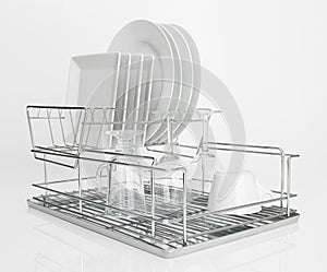 White dishes drying on metal dish rack