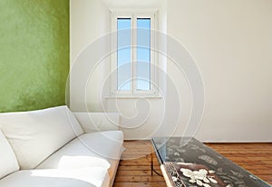 White divan, interior photo