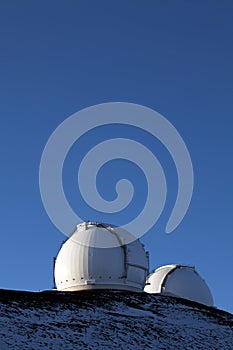 White dome structures against blue sky