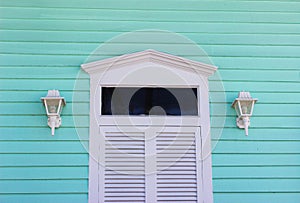 White Door with Aqua Siding