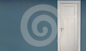 White door closed on blue wall background. Interior retro black metal doorknob and key lock