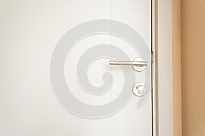 White door with handle and deadlock