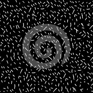 White dots on black background