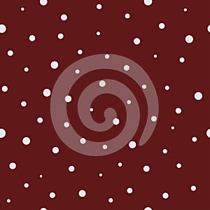 White dots with different size on red background. Seamless abstract pattern.