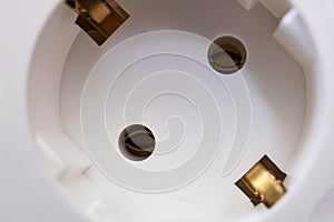 White double socket on black wooden table