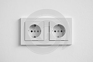 White double socket on wall - electric plug