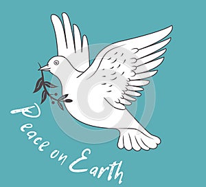 White Dove In Flight Holding An Olive Branch On Blue Background And With Text Peace On Earth.