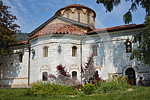 White dove flying above the main church, Bachkovo Monastery,