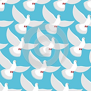 White Dove seamless pattern. Pigeons fly into blue sky backgrou