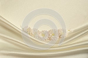 White draped fabric with asters