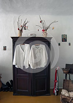 White Dresses hanging On cabinet