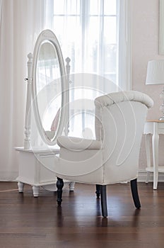 White dressing table and chair with glass miror