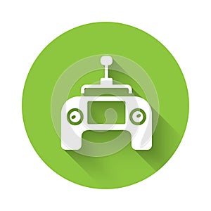 White Drone radio remote control transmitter icon isolated with long shadow. Green circle button. Vector