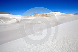 White dune at the lava field of the volcano Caraci Pampa at the Puna de Atacama, Argentina