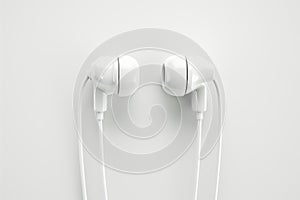 White In-Ear Headphones on a Plain Background