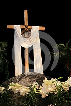 White Easter Lilies, Cross and Crown of Thorns photo