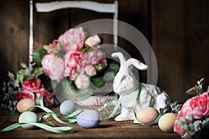 White Easter Rabbit with Colored Eggs