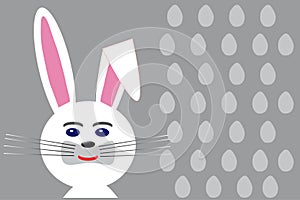 White Easter rabbit on eggs grey background