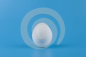 White egg  on a blue background