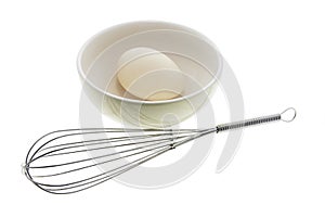 White Egg on Bowl with Egg Whisk