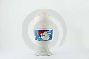 White egg on christmas holder