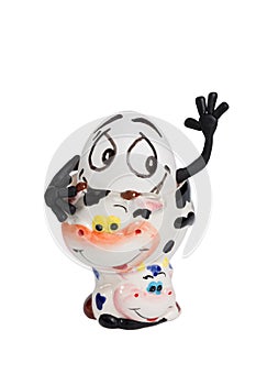 White egg with a funny face on stand